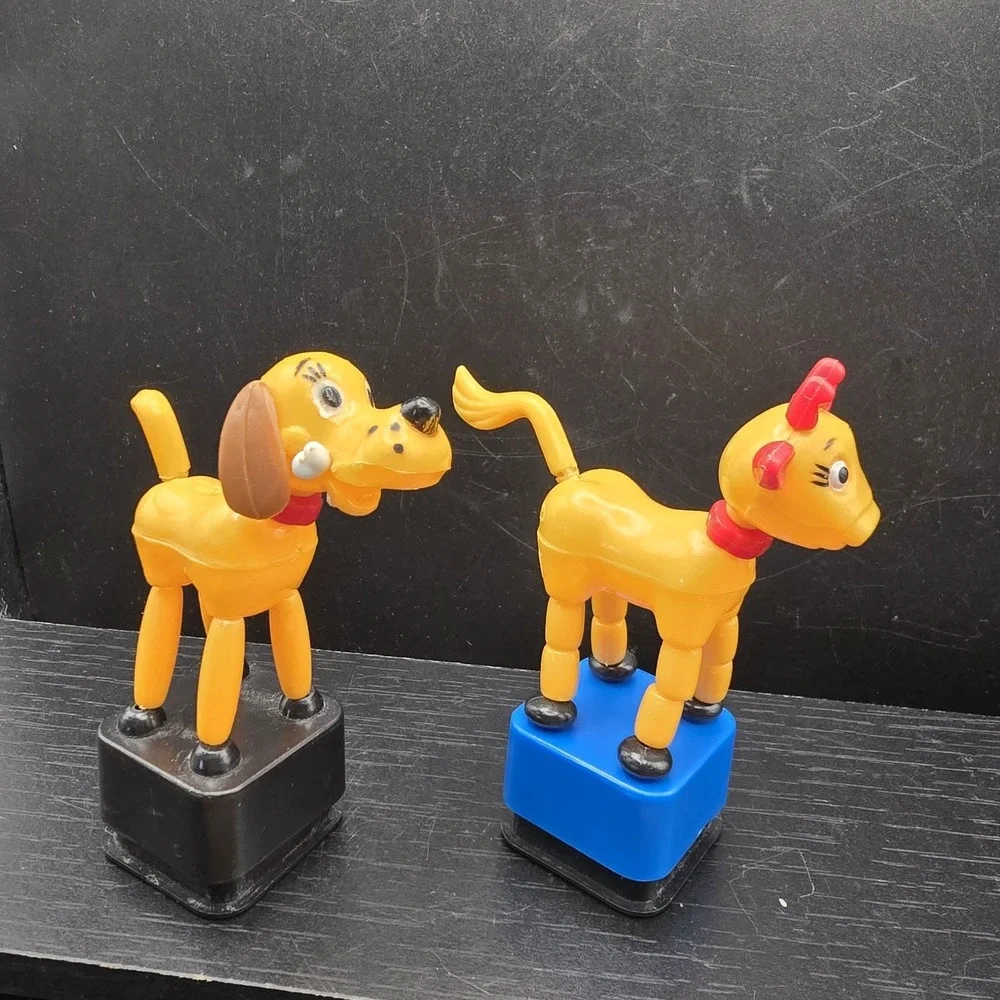 Yellow Cow And Dog With A Bone  Plastic Push Button Puppet Made in China